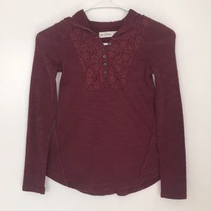Maroon colored long sleeve with hood